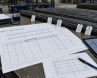 Rebar Cutting Plans: From BBS to Stock-Length Optimization